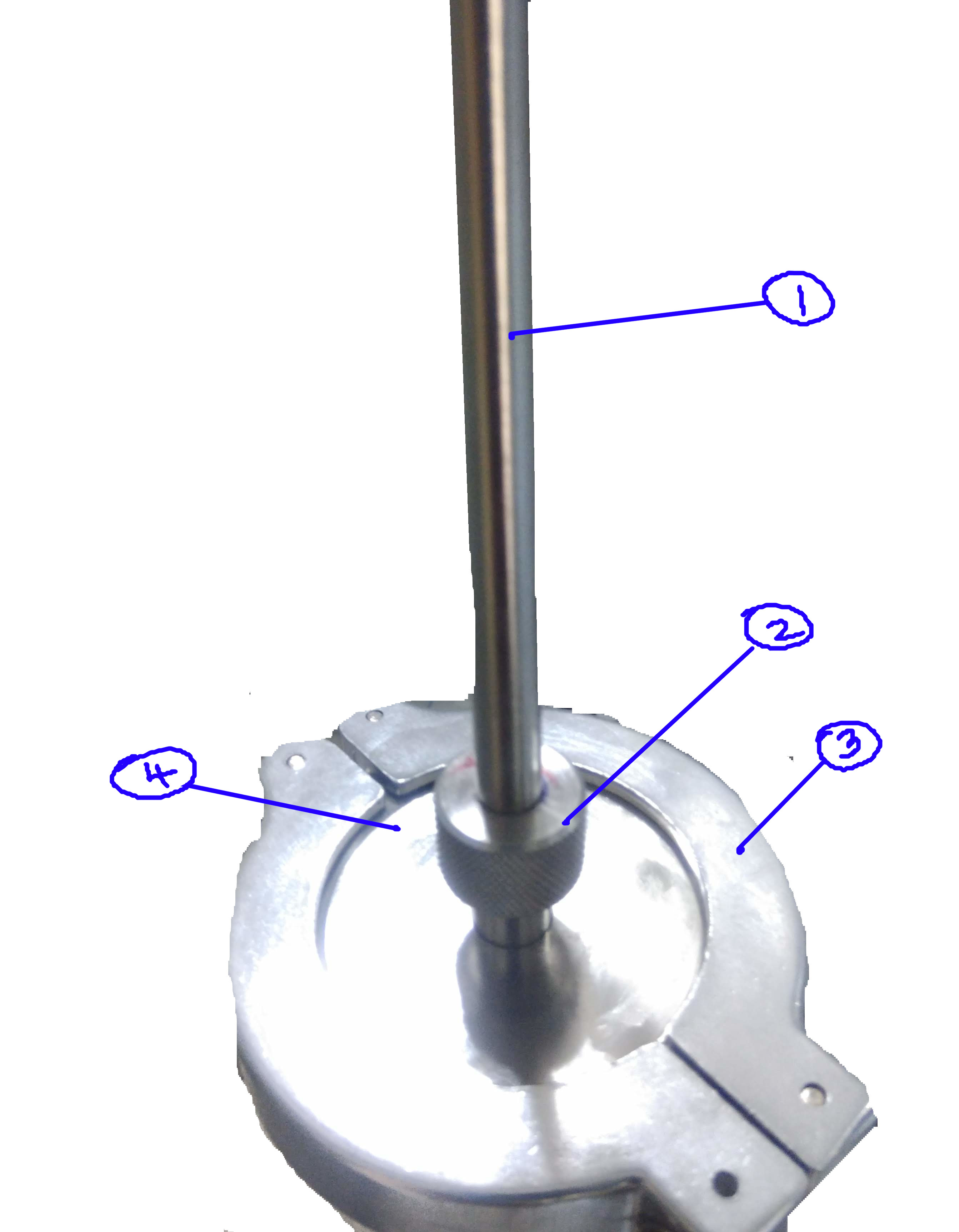 [[fig:View-Port-1]]{#fig:View-Port-1 label="fig:View-Port-1"}Sample insertion. 1)Probe stick 2) Rotatable Gripper of probe 3) Clamp 4) Quick clamp (shipping cap)
